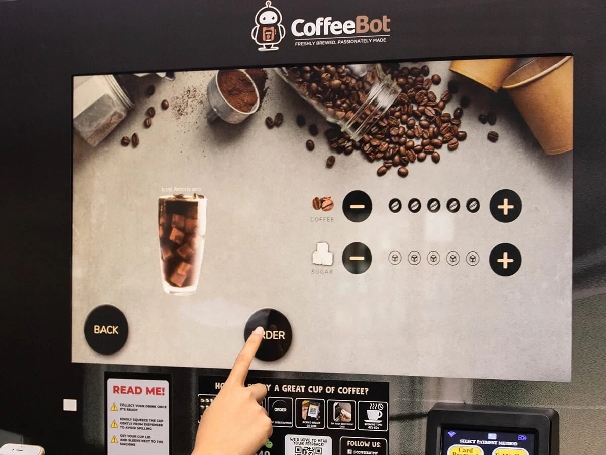 Ordering an iced Americano on a CoffeeBot touchscreen